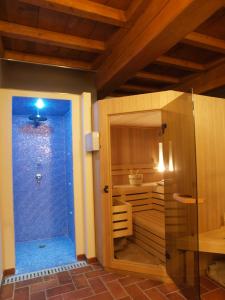 a bathroom with a shower in a room at Agriturismo Al Navile in Malalbergo +46 photos