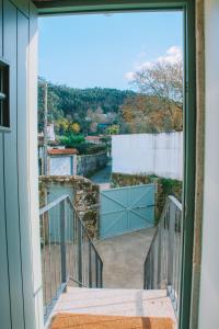 a view from the balcony of a house at Just Like Home - Casa da Tuca in Moledo