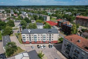 an aerial view of a city with buildings at Sandal Apartments in Šiauliai
