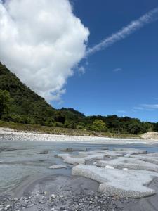 a view of a river with ice in the water at 陌野輕旅民宿 in Xiulin