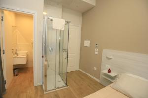 a bathroom with a glass shower and a toilet at B&B Costa degli Dei in Tropea +54 photos