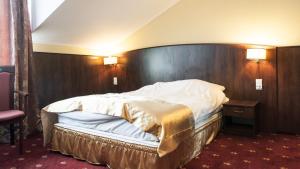Posteľ alebo postele v izbe v ubytovaní Hotel Kalchem