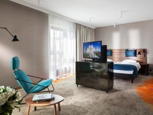 TV a/nebo společenská místnost v ubytování Hotel Sadova