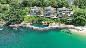 an aerial view of a resort on a beach at Porto Real Resort - Leisure and Fun in Mangaratiba