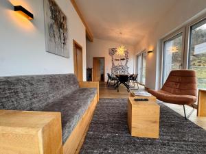 Zona d'estar a Boutique Aparthotel Chalets Coburg