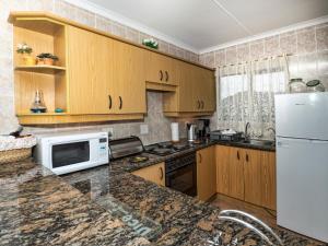 A kitchen or kitchenette at Villa Majestic for Exclusive Accommodation
