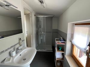 a bathroom with a sink and a shower at B&B da Nic e Ste in Casalbordino