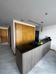 a kitchen with a counter top in a room at Penthouse Panoramic Terrace, San Felipe in Chihuahua