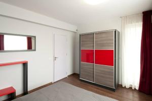 a room with a large glass door with a window at Sofia Top Lux Apartment in Sofia