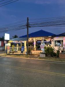 a gas station on the side of the road at Luxury Capsule Haus Phuket in Panwa Beach