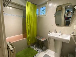 a bathroom with a sink and a shower at Bel Horizon in La Celle-sous-Gouzon