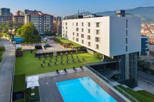 an overhead view of a hotel with a swimming pool at Occidental Bilbao in Bilbao