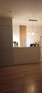 an empty room with a kitchen and a counter top at Polka in Chojnice