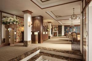 a lobby of a hotel with a reception area at Savoy 1918, a member of Small Luxury Hotels of The World in Oslo