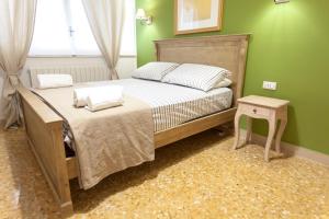 Posteľ alebo postele v izbe v ubytovaní Piazza Marina