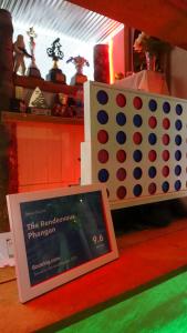 a picture of a board game with a picture of a game at The Rendezvous Phangan in Ko Phangan +114 photos