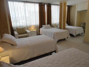 Voodi või voodid majutusasutuse HOTEL MAISON FIORI (Centro) toas