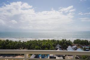 a view of the ocean from the balcony of a resort at Crocobeach Hotel in Fortaleza
