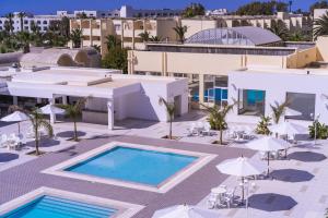 an aerial view of a resort with a swimming pool at Dar Khayam in Hammamet