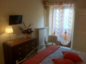 Postel nebo postele na pokoji v ubytování Porta Piccola B&B