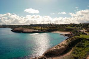 an aerial view of a body of water at Saludu Boutique in Porto Torres