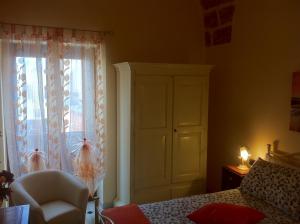 Postel nebo postele na pokoji v ubytování Porta Piccola B&B