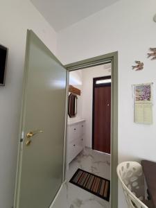 a bathroom with a shower with a glass door at Apartment Rino 1 Caorso in Caorso +32 photos