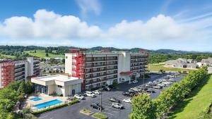 an aerial view of a building with a parking lot at New 2 Bed 2 Bath Condo with Pool at BMS in Bristol