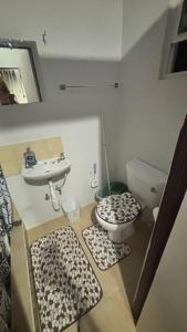 a bathroom with a toilet and a sink at Hidden Castle in Saint George +15 photos