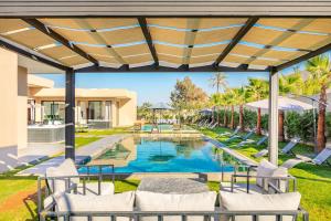 an image of a swimming pool in a house at Villa Prestige Privée avec Vue Splendide in Marrakesh