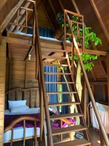 a room with bunk beds in a tree house at VR Nature Cottage CABANA in Wellawaya