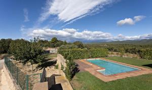 an image of a swimming pool in a yard at Cal Fortic, Navès in Navés