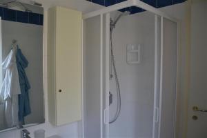 a bathroom with a shower and a sink at Casa Tirli in Tirli
