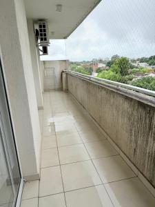 a balcony with a view of a city at Cabildo Apart Familiar in Santiago del Estero