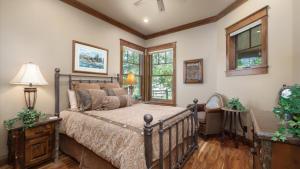 a bedroom with a bed and a window at Rock Creek Escape in Red Lodge