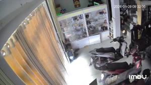 an overhead view of a kitchen with a motorcycle in a room at Spa Ý Phát in Ấp Yên Thượng