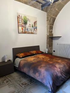 a bedroom with a large bed in a room at Casa vacanze La Fenice 2 in Pietranico