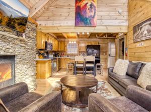 a living room with a couch and a table at Ole Red in Gatlinburg