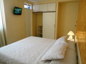 Voodi või voodid majutusasutuse HOTEL MAISON FIORI (Centro) toas