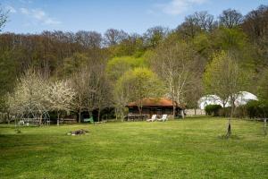 a house in the middle of a field at Бунгала Дара in Kalofer +16 photos