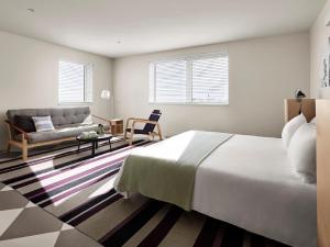 Ένα ή περισσότερα κρεβάτια σε δωμάτιο στο The Asbury Hotel