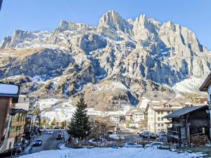 a city with a mountain in the background at Apartment Studio Turmalin by Interhome in Leukerbad