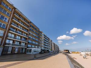 a building on the beach next to the beach at Apartment Trondjhem with seaview by Interhome in Bruges