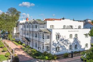 an aerial view of a white building at Strandhaus Belvedere in Binz