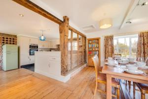 a kitchen and dining room with a table and chairs at 3 Bed in Ridlington oc-2253 in Walcott