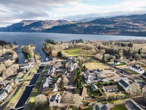 an aerial view of a small town next to a body of water at Chalet The Chalet by Interhome in Fort Augustus