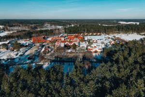 an aerial view of a resort in the snow at Zajazd Fojutowo in Legbąd