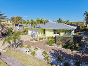 an aerial view of a house with palm trees at Tahitian Waters in Sanibel