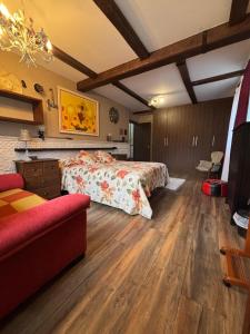 a bedroom with a bed and a couch at Castillo Valmoral in Burgos +38 photos