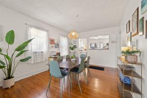 a dining room with a table and chairs at Walk to Beach - Beach Gear - Easy Parking in Long Beach